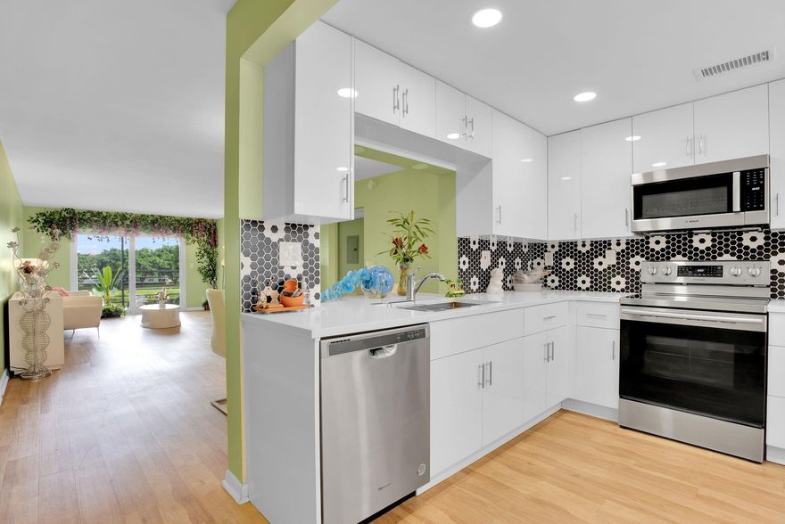 *Unmatched Opportunity Near Village Pool, Theatre, and Clubhouse Restaurant**Discover this exquisitely remodeled home that combines elegance and practicality. The gourmet kitchen features a stylish open pass-through to the dining area, perfect for entertaining. Enjoy unparalleled safety with impact-resistant windows and doors throughout. Step onto your serene screened patio and soak in breathtaking views of  golfcourse & Water w/Fountain.. This residence boasts lavish remodeled bathrooms adorned with quartz countertops, custom closets tailored for abundant storage, and a desirable north-facing orientation that floods the space with natural light while avoiding direct sunlight. This luxurious home epitomizes comfort, security, and sophisticated living @prime location!  A/C 2022 WTRHTR $2020