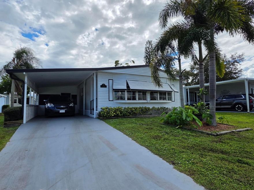 Welcome to Spanish Lakes Golf Village! This beautifully maintained 2-bedroom, 2-bath manufactured home offers comfort, style, and ease of living. Featuring spacious bedrooms, an open living area, and a bright kitchen perfect for entertaining or relaxing. The home comes partially furnished, making your move-in simple and convenient. Step outside to enjoy perfectly kept landscaping that enhances the home's curb appeal and provides a peaceful outdoor retreat. Located in an active 55+ community with golf, pools, tennis, and clubhouse activities included in the lot lease, this property is ideal for year-round living or a seasonal getaway. Schedule your private showing today and experience the Florida lifestyle you've been dreaming of!