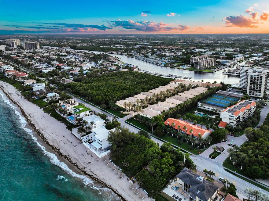 Gated, 355' to deeded beach access and a private 50' dock with boat lift directly on the ICW with ocean access. Welcome to 4042 S Ocean Blvd in Highland Beach, a true south Florida pinnacle retreat. Ocean Cove is a one-of a-kind private gated enclave of only 22 executive homes built with the extreme high quality JH Norman construction is known to deliver. Ideally located between the intracoastal and 355 feet from the front door to the beach, this recently updated pool home is absolutely immaculate and shows like a model. Step in to dramatic high ceilings, polished stone floors, floor to ceiling impact windows, separate living and family rooms to make getting together inside or out a breeze. The heart of the home has been updated with custom 2-tone wood cabinets, stunning extremely durable