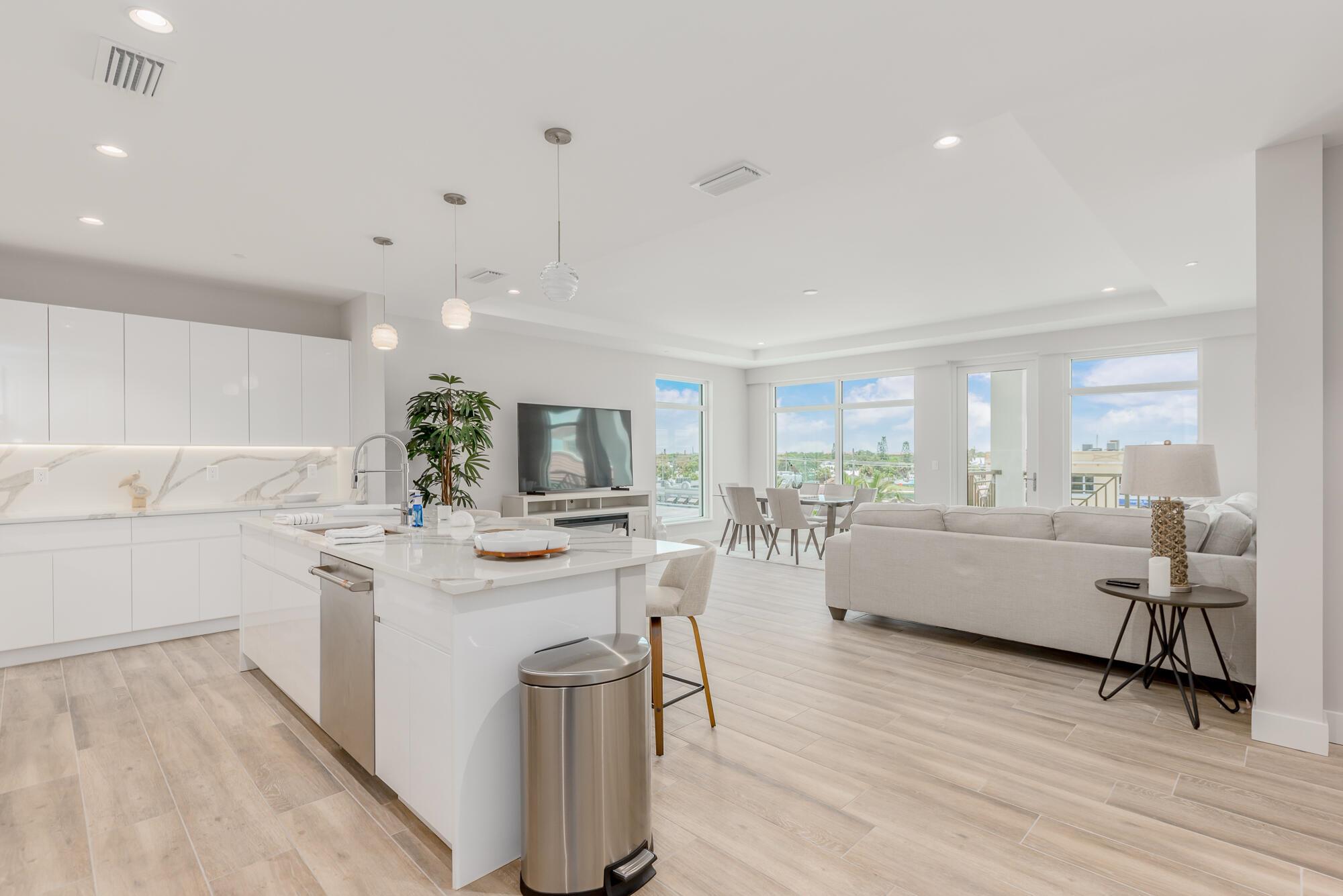Experience Florida living at its finest in this stunning, fully furnished top-floor corner unit in the exclusive Sailfish Cove riverfront community, located in the heart of Stuart, FL. Property Features: Spacious Layout: 2 bedrooms + Den, 2 bathrooms with an open kitchen concept. Oversized Balcony: Perfect for enjoying tranquil views and Florida breezes. Resort-Style Amenities: Pool, Jacuzzi, outdoor kitchen, and a scenic rooftop viewing deck. Modern Convenience: Two elevators and a pet-friendly community. This luxurious ocean access riverfront unit offers the ultimate in comfort and style, making every day feel like a vacation.