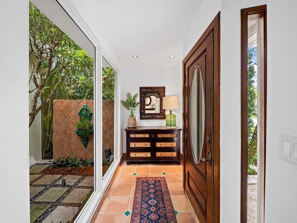 Photo of 347 Poinciana Drive, Fort Lauderdale, FL 33301 (MLS # F10550952)