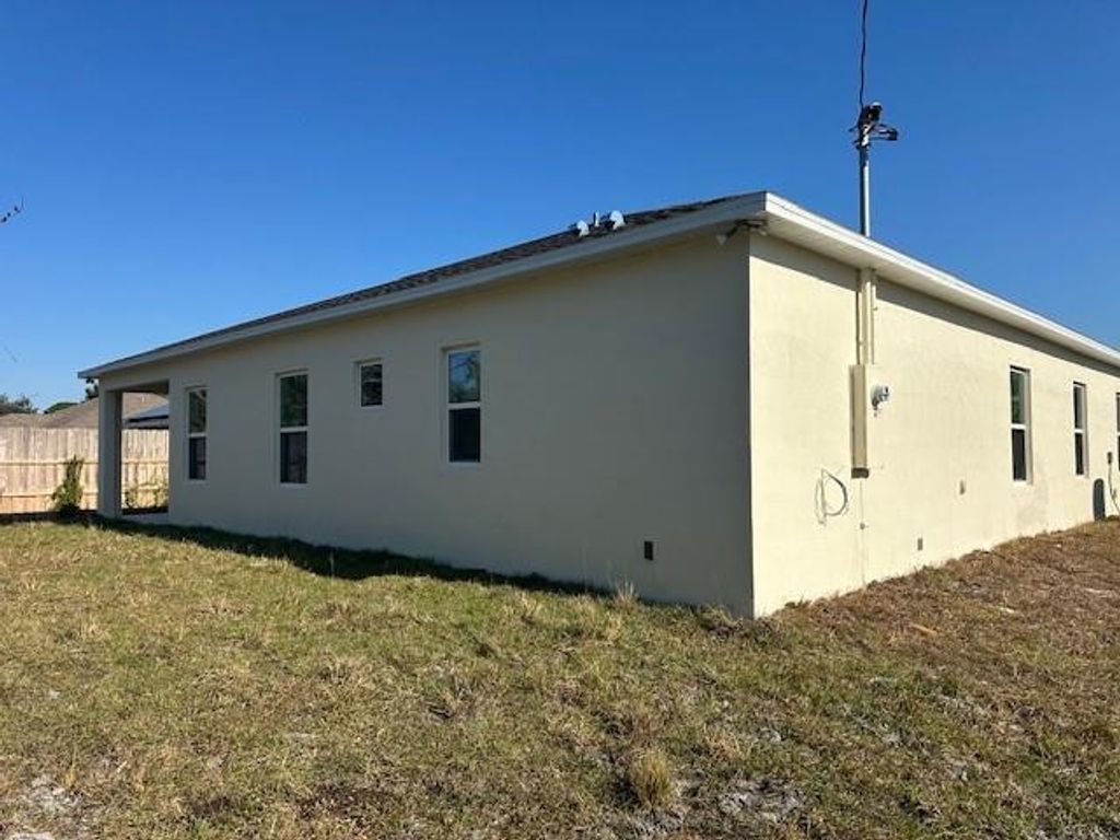 Photo of 1618 SE Shepard Lane, Port Saint Lucie, FL 34983 (MLS # F10491834)