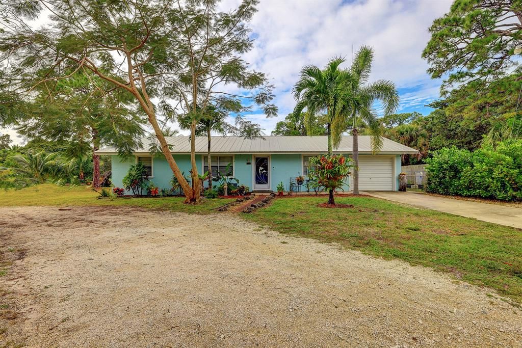 Photo of 5140 SE Front Avenue, Stuart, FL 34997 (MLS # R10854274)