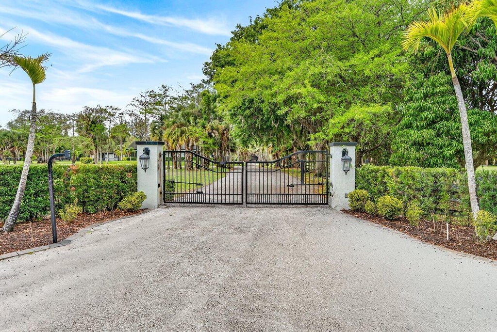 Photo of 2741 Buck Ridge Trail, Loxahatchee, FL 33470 (MLS # B26092024)