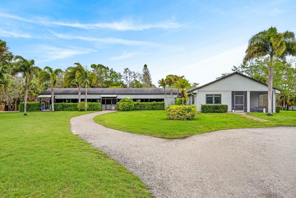 Photo of 2741 Buck Ridge Trail, Loxahatchee, FL 33470 (MLS # B26092024)