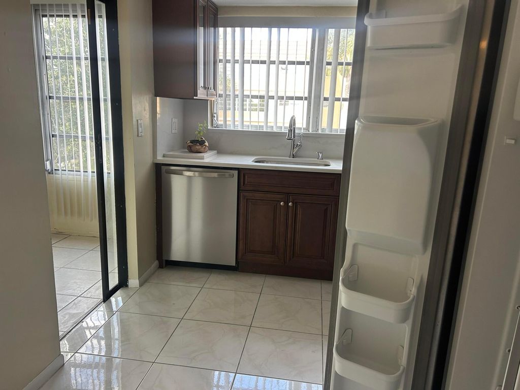 Photo of 2451 NW 41st Avenue #307, Lauderhill, FL 33313 (MLS # B26001623)