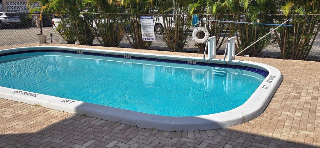 Photo of 3930 Crystal Lake Drive #210, Deerfield Beach, FL 33064 (MLS # F10494321)