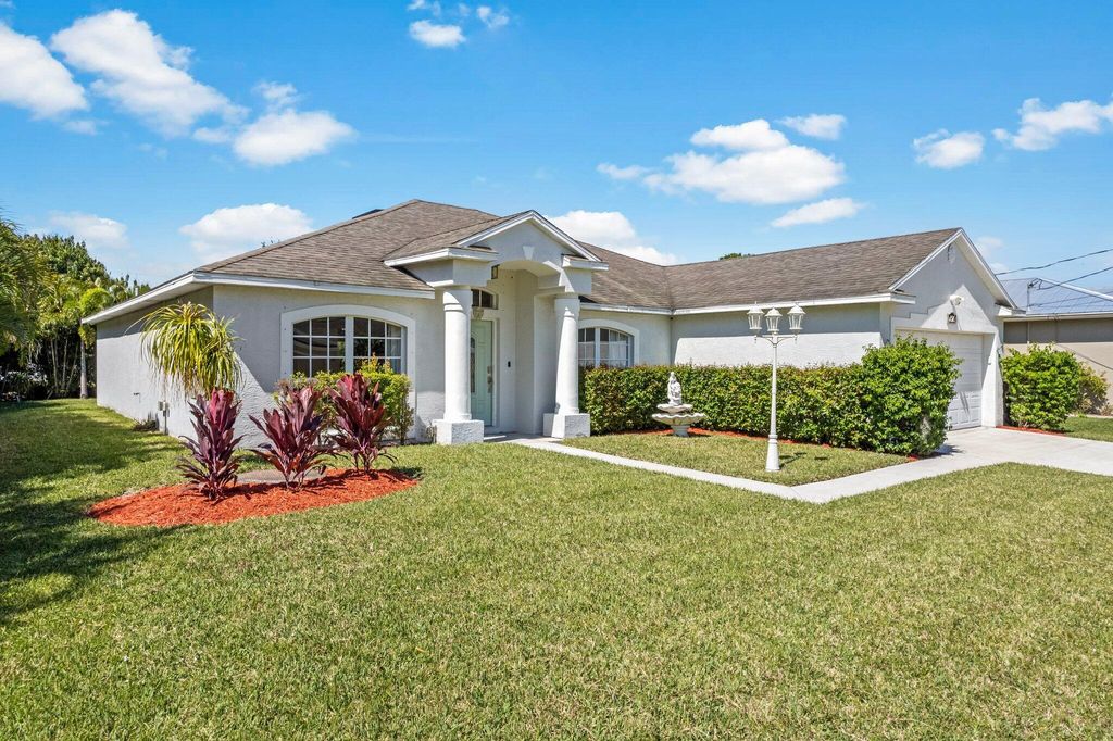 Photo of 2326 SW Antiquera Street, Port Saint Lucie, FL 34953 (MLS # R10964532)