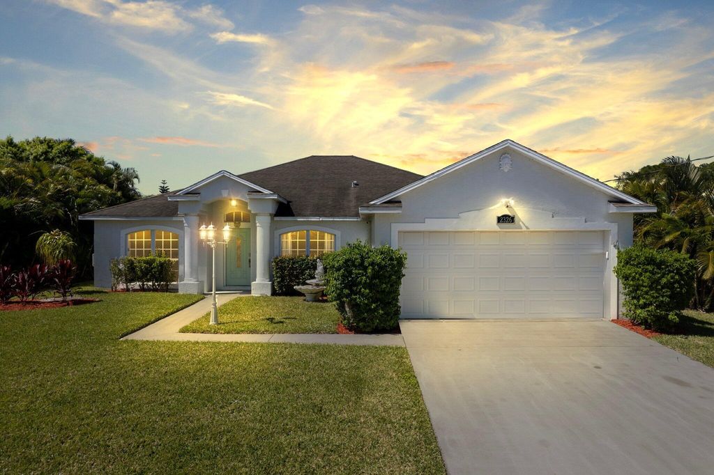 Photo of 2326 SW Antiquera Street, Port Saint Lucie, FL 34953 (MLS # R10964532)