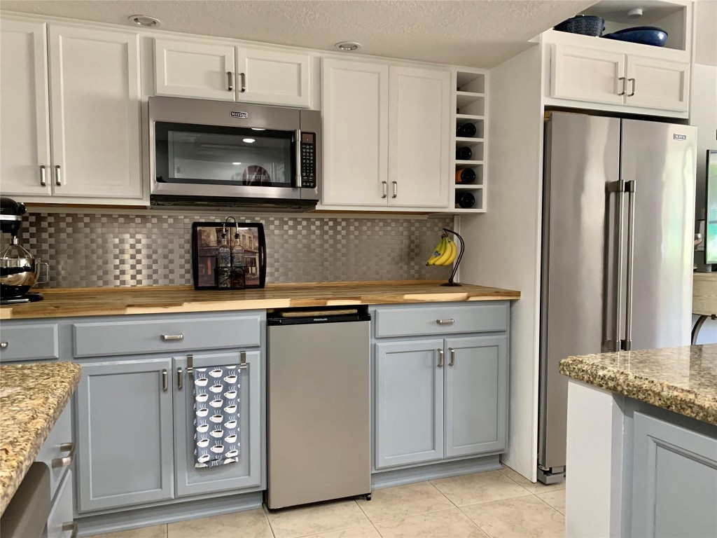 THE WOODS CONDOMINIUM - Residential