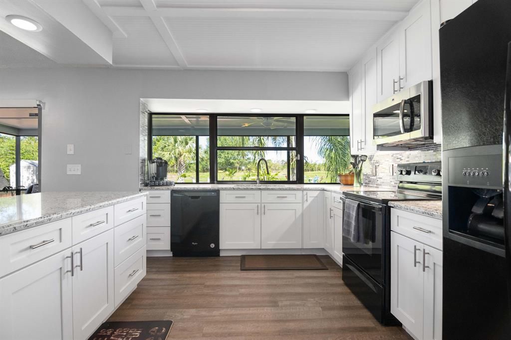 Photo of 3528 SW Zullo Street, Port St Lucie, FL 34953 (MLS # R10827974)