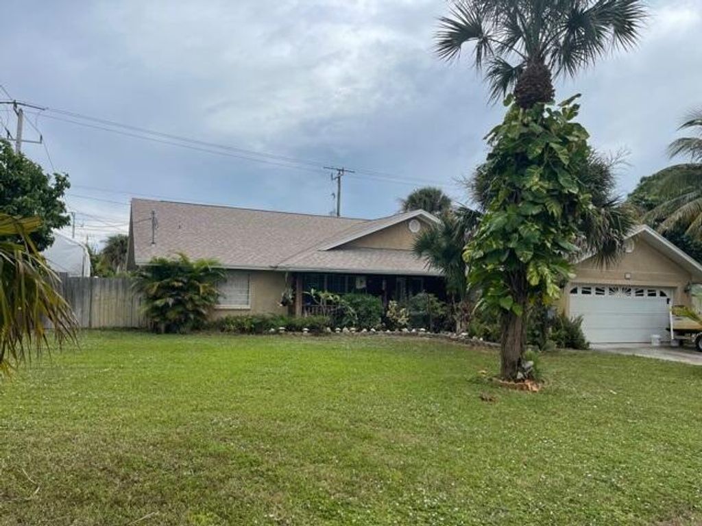 Photo of 701 SE Dolphin Drive, Stuart, FL 34996 (MLS # R10754425)