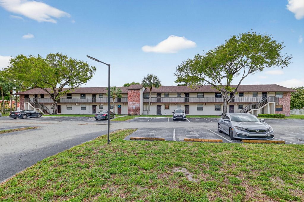 Photo of 6001 Shakerwood Circle #201, Tamarac, FL 33319 (MLS # B26009368)