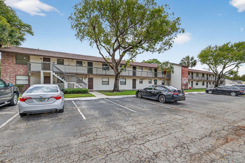 Photo of 6001 Shakerwood Circle #201, Tamarac, FL 33319 (MLS # B26009368)
