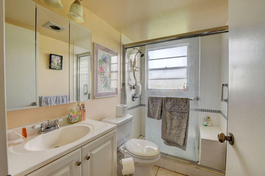 Beautiful first floor corner unit filled  with lots of natural light and a serene lake view. This condo offers updated laminate flooring, updated kitchen with modern cabinetry, and a shower stall. Be part of this active 55 plus community.