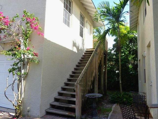 This charming Key West-style efficiency is located less than one mile from Downtown Stuart, on the outskirts of North River Shores in Riverside Park. Enjoy the freedom of no HOA and the convenience of having electric, water, sewer, and trash included in the rent. The apartment offers a full kitchen, full bath, storage closet, and a spacious great room/bedroom, along with impact windows, a metal roof, and easy-care laminate and tile floors with no carpet. A stackable washer/dryer is included in the unit, and a small open porch at the entry provides a welcoming touch. The location is ideal, with an easy walk to a variety of local restaurants and just steps from a public park offering water access to the St. Lucie River for paddleboarding or kayaking, plus a small dog park.