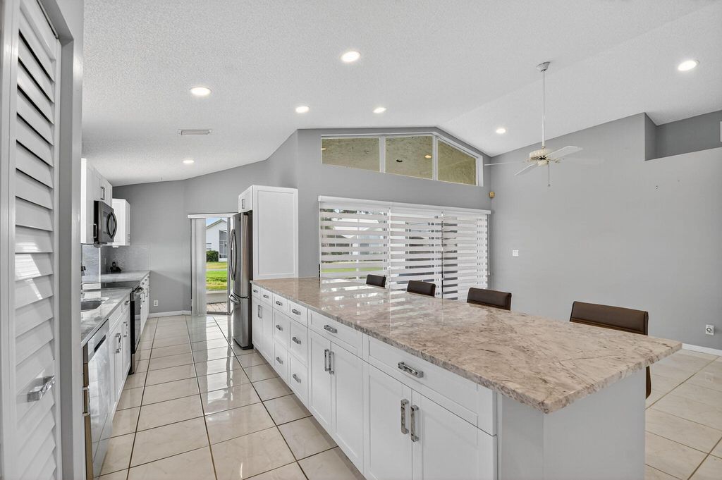 Photo of 6037 Bay Isles Drive, Boynton Beach, FL 33437 (MLS # R11114148)