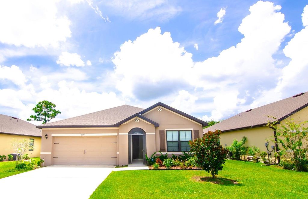 Photo of 6205 NW Regent Street, Port Saint Lucie, FL 34983 (MLS # R11162712)