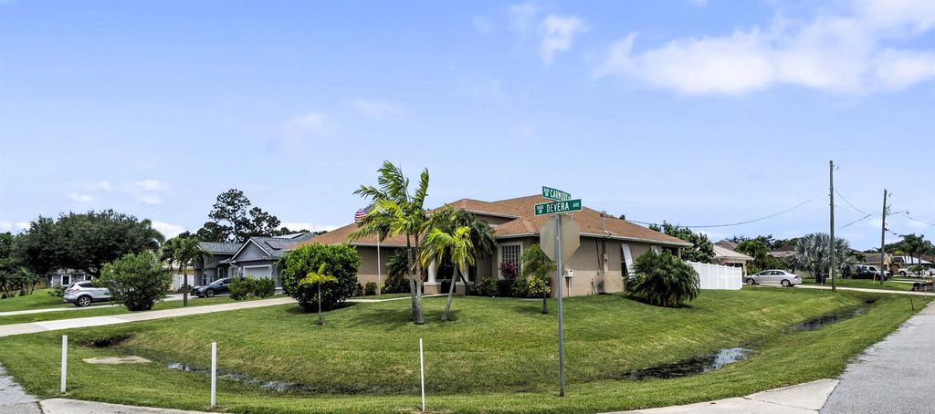 Photo of 1417 SW Devera Avenue, Port St Lucie, FL 34953 (MLS # R10898967)