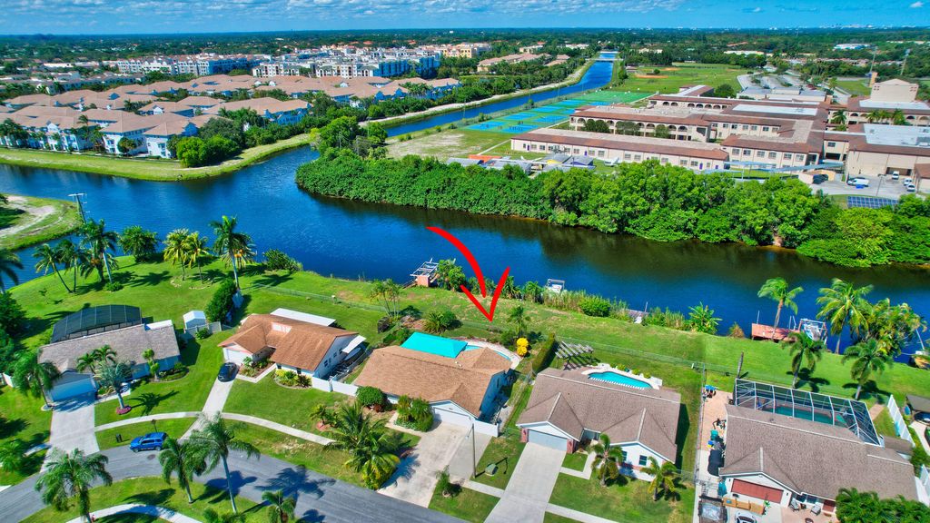 Photo of 1275 NW 13th Avenue, Boynton Beach, FL 33426 (MLS # R11130373)