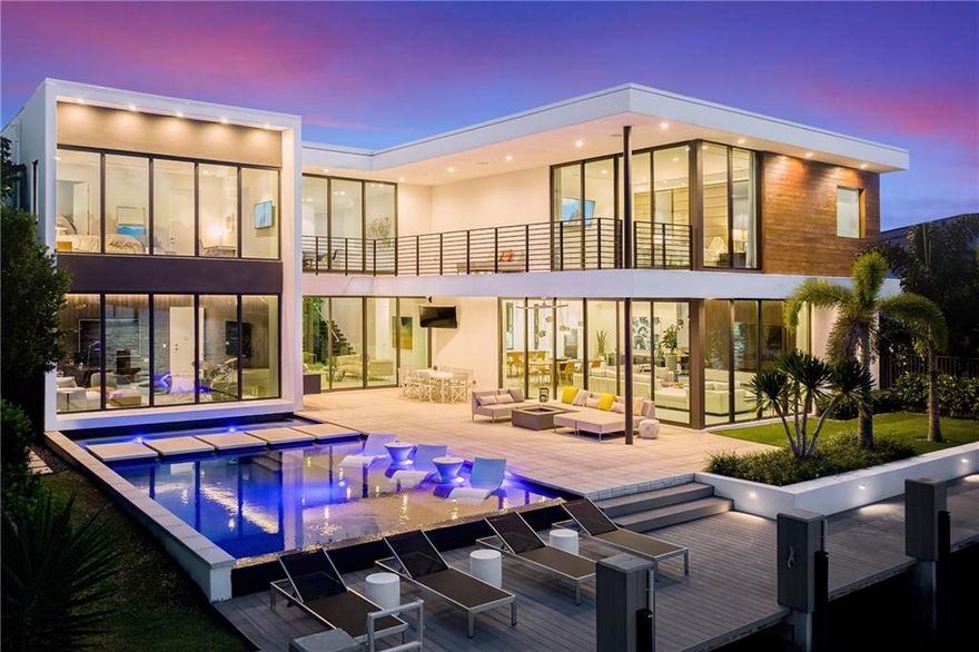 Modern living, reimagined. This sensational direct Intracoastal waterfront estate is a must see! Greeted w/ the finest luxury finishes & features throughout, this home is fully equipped & move-in ready. Featuring luxurious guest suites along w/ a gorgeous Primary Suite w/ long Intracoastal water views, separate dual Owners' baths & walk-in closets. Includes an oversized loft, spacious club room, Sub-Zero & Wolf appliances, elevator, generator, Control4 Smart Home, Sonos Sound System & more! Enjoy the large covered patio & balcony, heated saltwater Infinity edge pool & spa, built-in grill, huge dock w/boat lift in a no-wake zone on the Intracoastal, offering 80' of WF. Walk to Lauderdale by the Sea dining, shopping & Beach. This home offers both location and lifestyle!