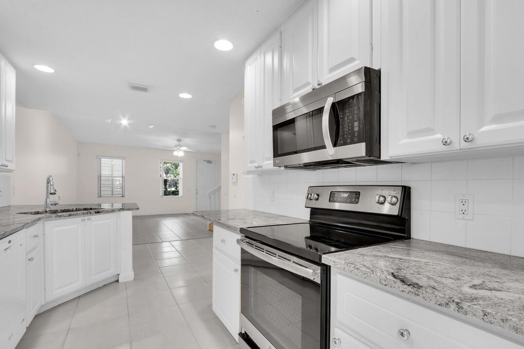 Photo of 3183 E Community Drive, Jupiter, FL 33458 (MLS # R11095377)