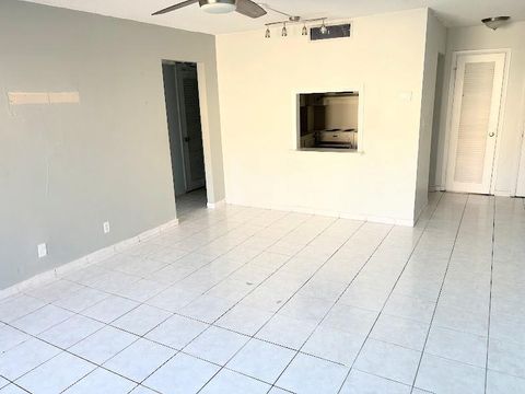Photo of 660 Tennis Club Dr #306, Fort Lauderdale, FL 33311 (MLS # F10533289) Photo of 660 Tennis Club Dr #306, Fort Lauderdale, FL 33311 (MLS # F10533289)