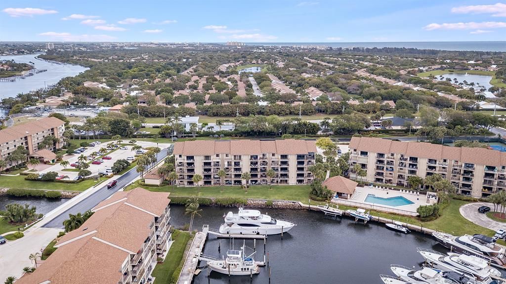Photo of 1601 Marina Isle Way #202, Jupiter, FL 33477 (MLS # R10785328)