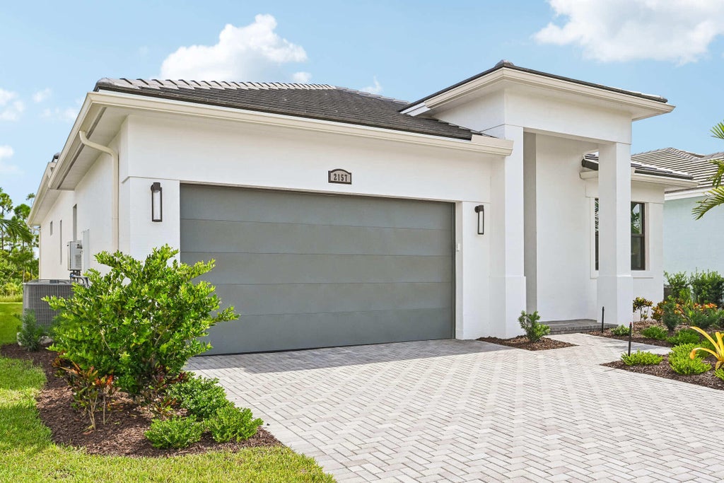 Photo of 2157 SE Mosaic Boulevard, Port Saint Lucie, FL 34984 (MLS # B26065580)