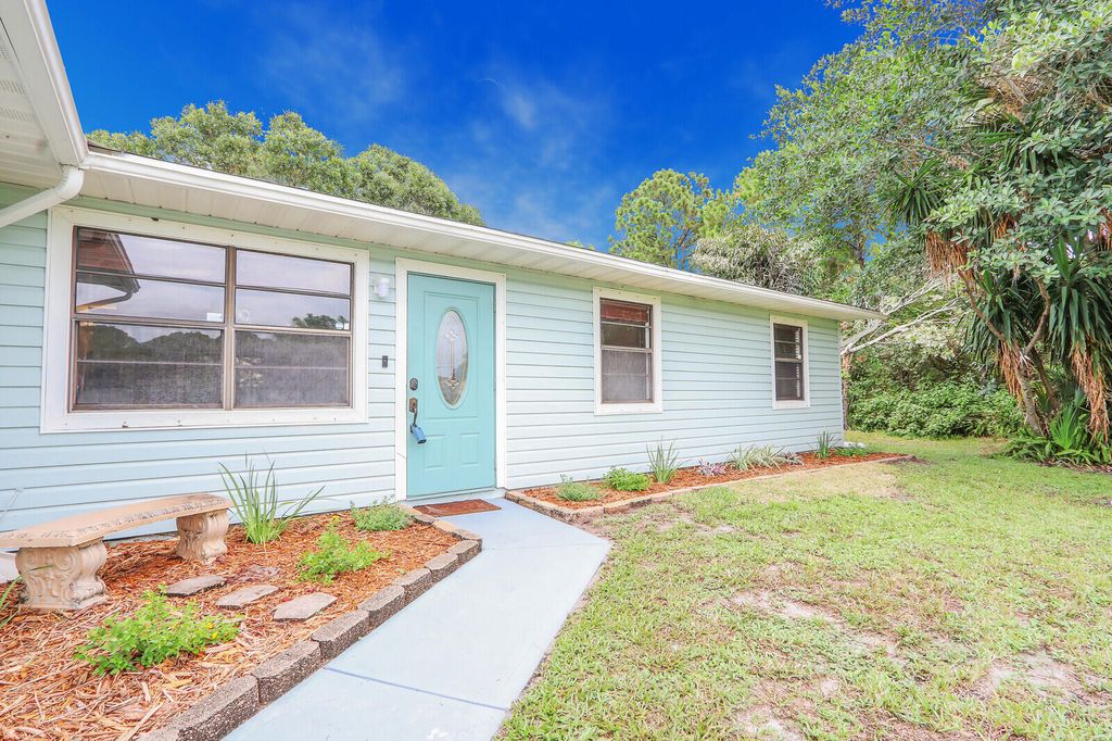 Photo of 2391 SE Mariola Avenue, Port Saint Lucie, FL 34952 (MLS # R11003816)