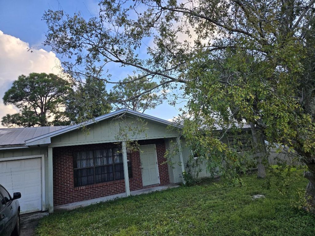 Photo of 761 NW Bayshore Boulevard, Port Saint Lucie, FL 34983 (MLS # R11133013)