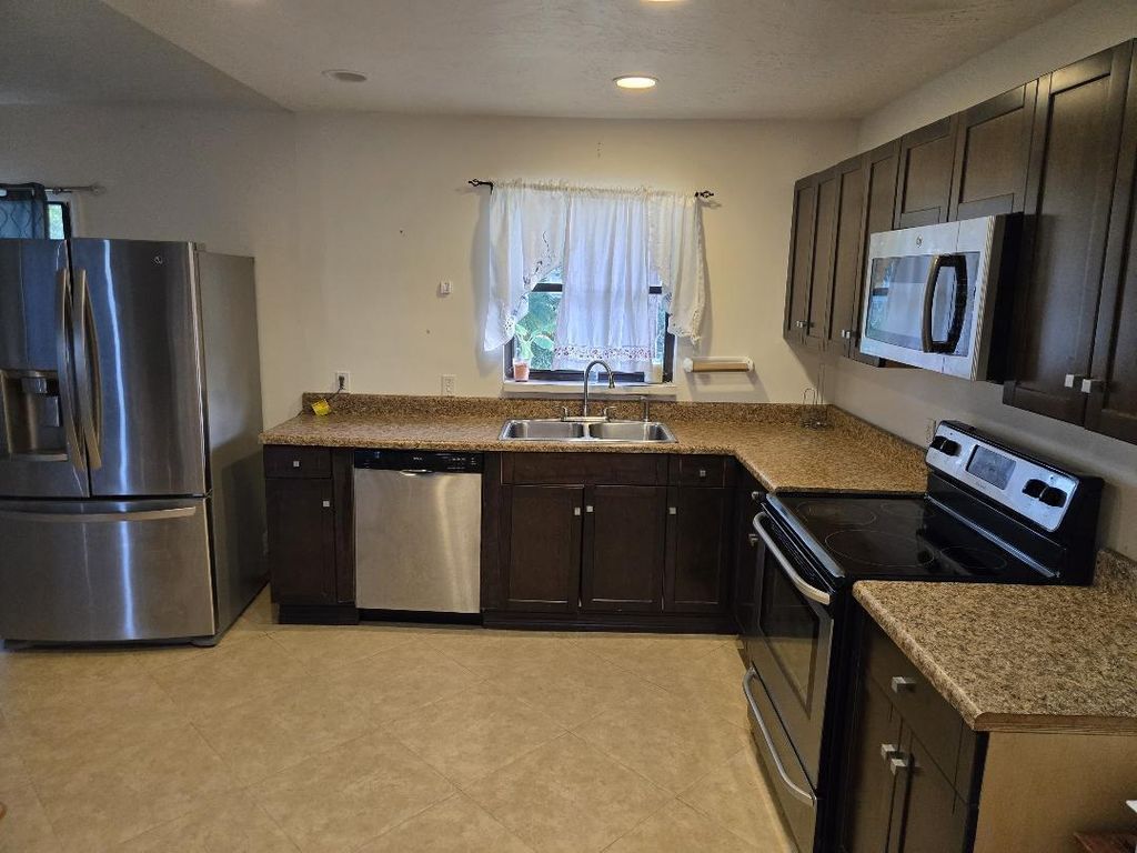 Photo of 761 NW Bayshore Boulevard, Port Saint Lucie, FL 34983 (MLS # R11133013)