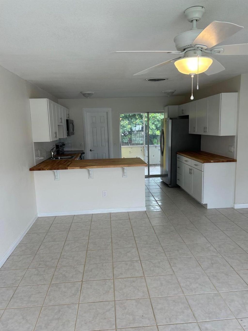Photo of 2180 NE Rustic Way, Jensen Beach, FL 34957 (MLS # R11097925)