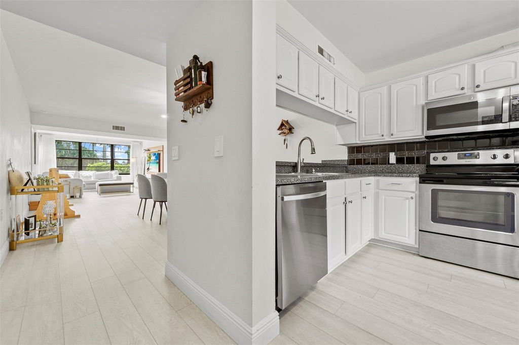 Photo of 6061 Balboa Circle #103, Boca Raton, FL 33433 (MLS # F10517545)