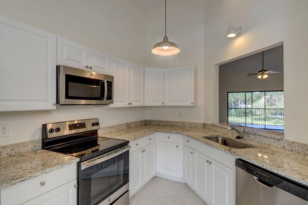 Photo of 3470 SE Martinique Trace #201, Stuart, FL 34997 (MLS # F10405132)