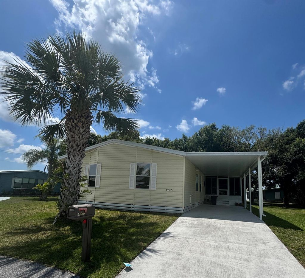 Photo of 13965 Cancun Avenue, Fort Pierce, FL 34951 (MLS # R11093643)