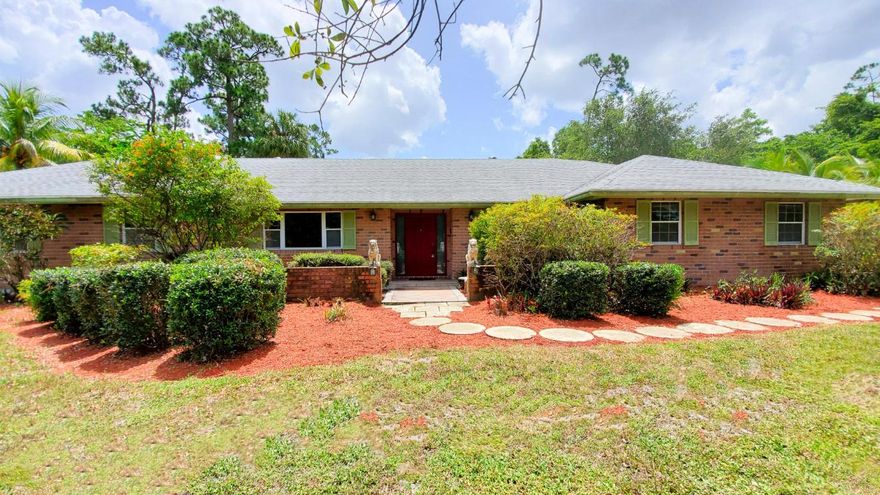 Lots of extras in this 3 bedrooms, 2.1 bath home including 1.61 acres, updated kitchen, french doors, open covered porch, separate workshop and large rooms.  Perfect home for entertaining!  Large backyard with room for pool or guest house. No HOA!