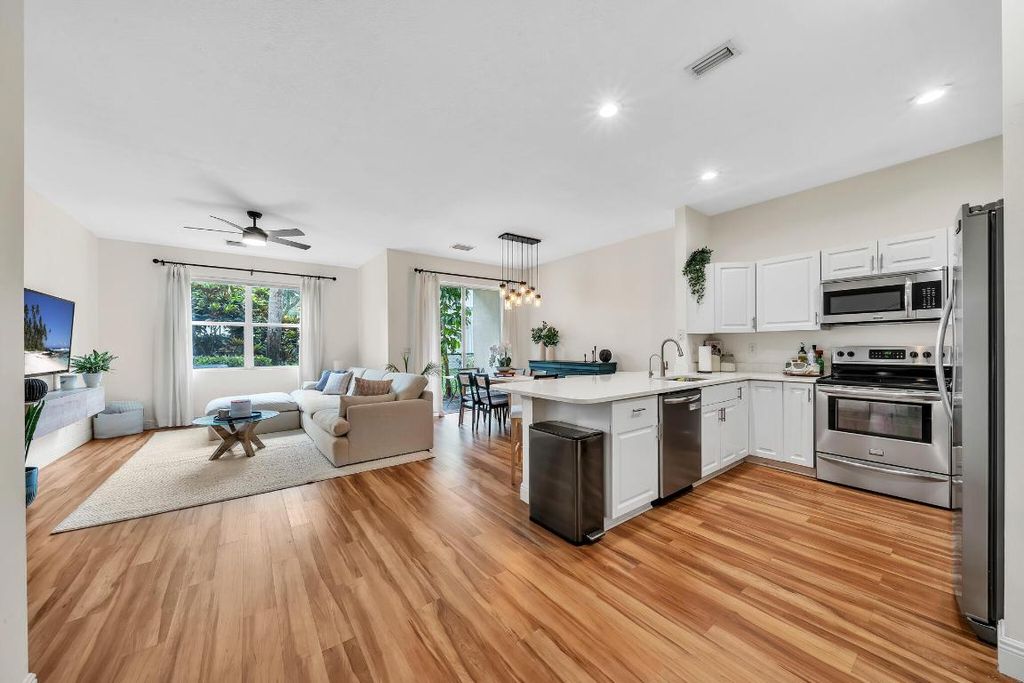 Photo of 6086 Seminole Gardens Circle, Riviera Beach, FL 33418 (MLS # R11097265)