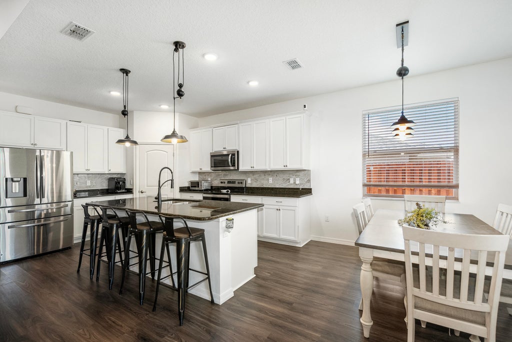 Photo of 1957 SW Glendale Street W, Port Saint Lucie, FL 34987 (MLS # R10981611)