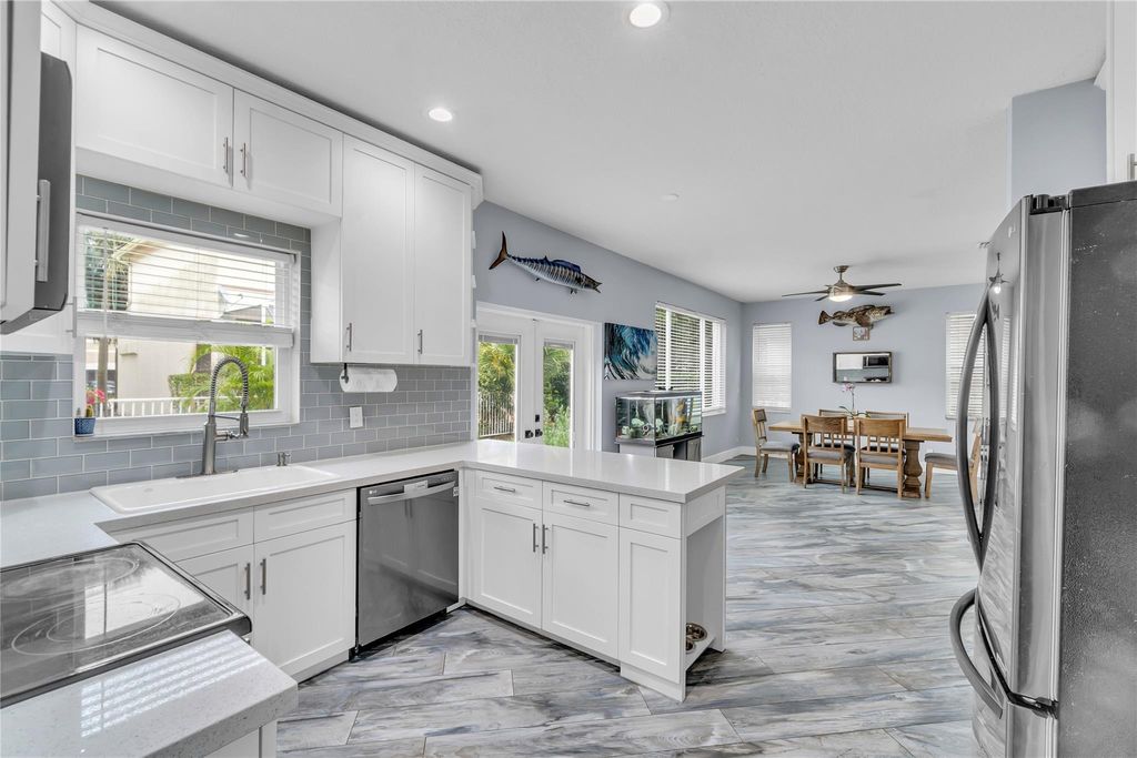 Photo of 847 NW 127th Ave, Coral Springs, FL 33071 (MLS # F10540082)