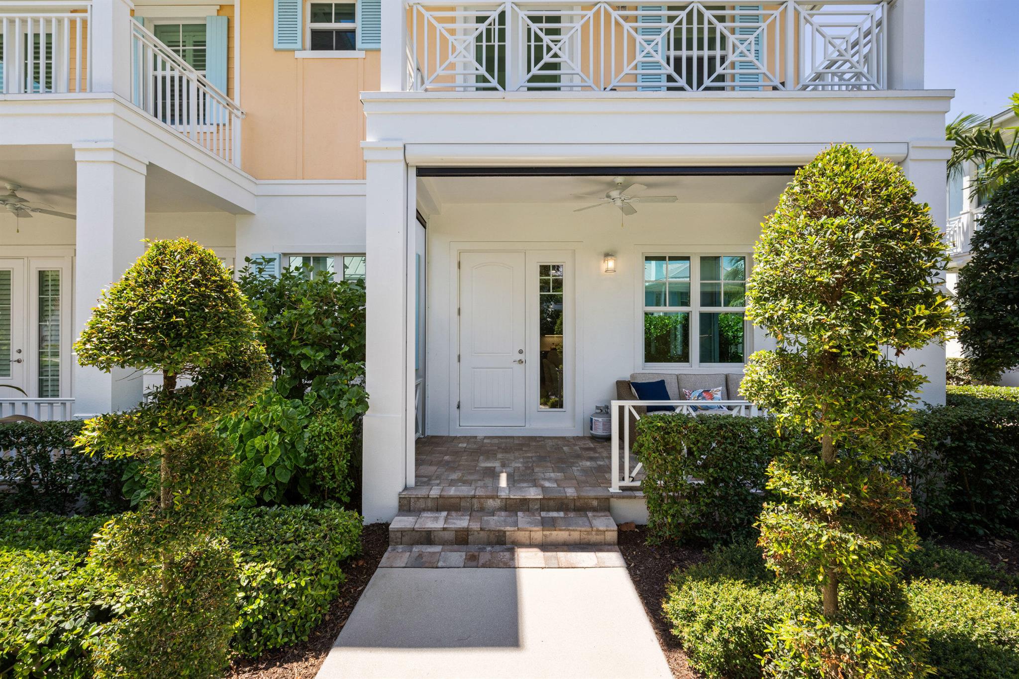 Now available for rent, this beautifully appointed 3-bedroom, 2.5-bath end-unit townhome is located in the exclusive gated community of Inlet Waters. Built in 2021, this coastal-style residence features a bright, open floor plan with high ceilings, wide-plank wood flooring, and designer finishes throughout.The gourmet kitchen offers quartz countertops, custom cabinetry, high-end appliances, and a large island with seating--perfect for entertaining. The spacious living and dining areas flow seamlessly to the private outdoor space. Upstairs, the primary suite includes a large walk-in closet, spa-like bath with dual vanities and frameless glass shower, and a private balcony with lush tropical views. Two additional bedrooms provide ample space for guests or office use.