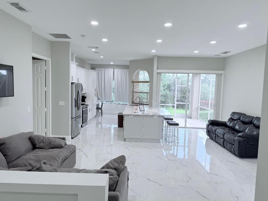 Photo of 861 SW Munjack Circle, Port Saint Lucie, FL 34986 (MLS # R11151936)