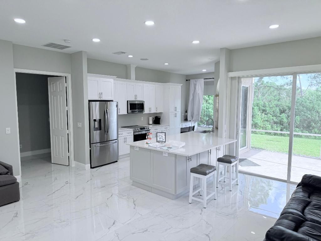 Photo of 861 SW Munjack Circle, Port Saint Lucie, FL 34986 (MLS # R11151936)