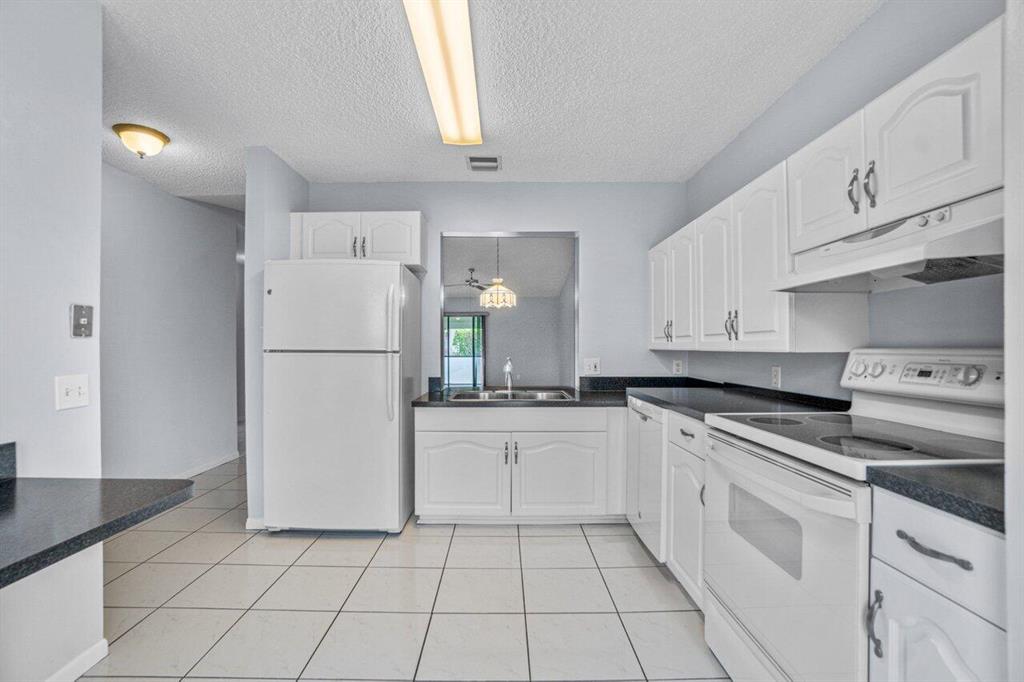 ARBOURS II OF THE PALM BEACHES CONDO - Residential