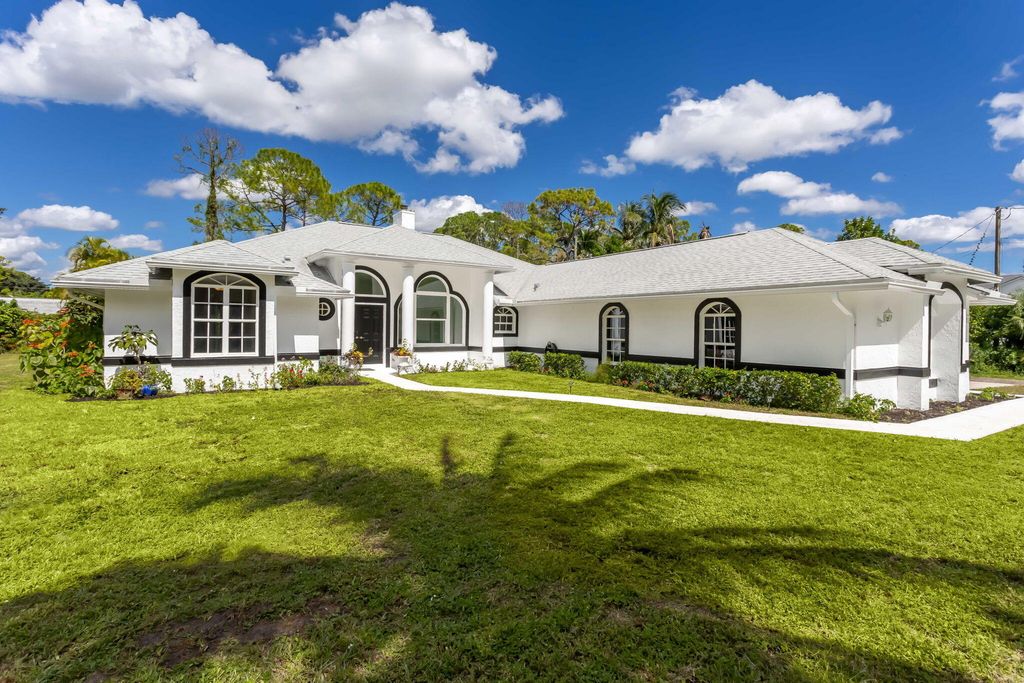 Photo of 15235 82nd Lane N, The Acreage, FL 33470 (MLS # R11134061)