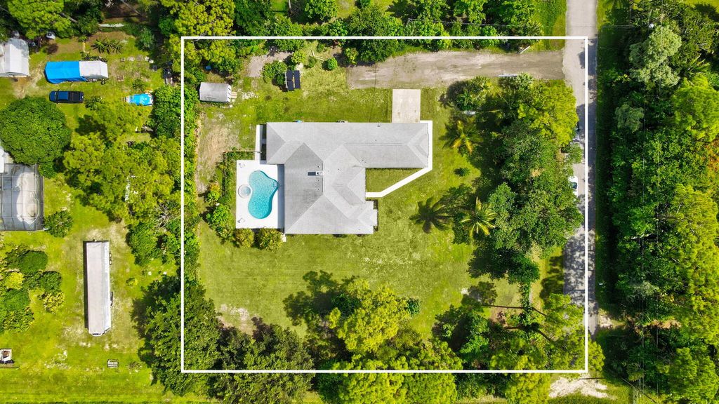 Photo of 15235 82nd Lane N, The Acreage, FL 33470 (MLS # R11134061)