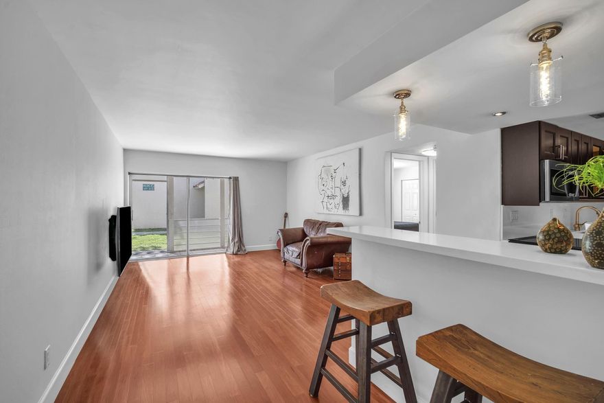 PRICE REDUCTION!!! Nicely upgraded first floor, 1 bedroom with one and a half bathrooms. Screened in patio looking out to courtyard with BBQ area, heated pool, sauna, clubhouse with a fitness center. Electrical updated and has hook-ups for your own in unit washer and dryer. Association working on parking pavement and landscaping. No assessments at this time. Close to shopping and the beautiful Florida beaches. QUALIFIED BUYERS CAN BUY WITH AS LITTLE AS 3% 0r 5% DOWN. FIRST TIME HOMEBUYERS COULD POSSIBLY GET IN WITH LESS THAN $4000 OUT OF POCKET