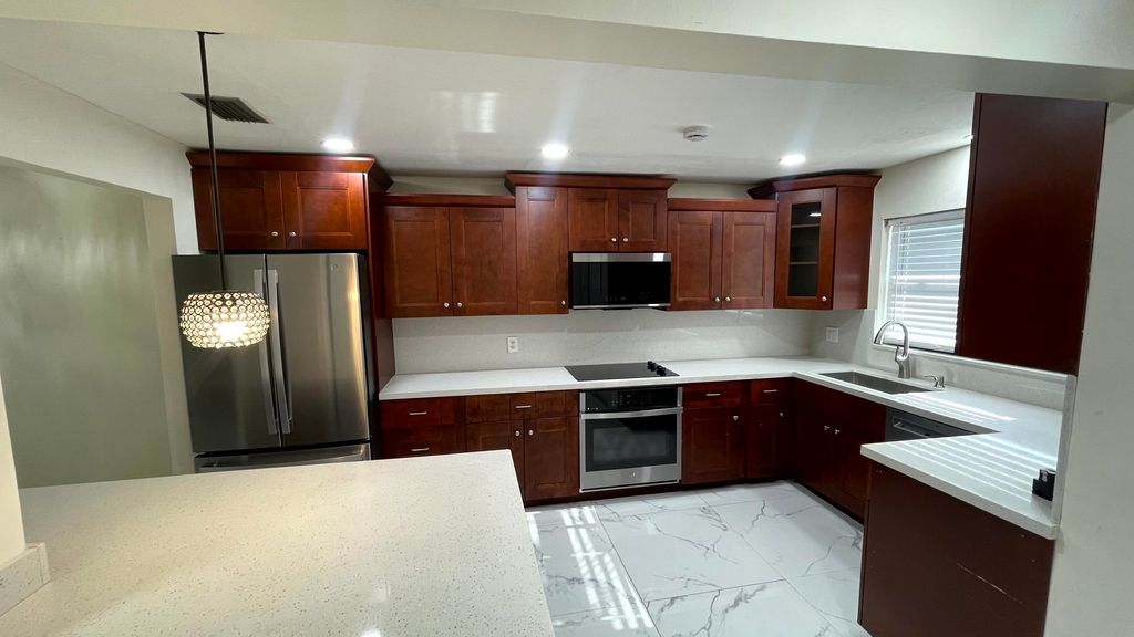 Photo of 9110 Orchid Tree Lane #138, Pembroke Pines, FL 33024 (MLS # B26028159)