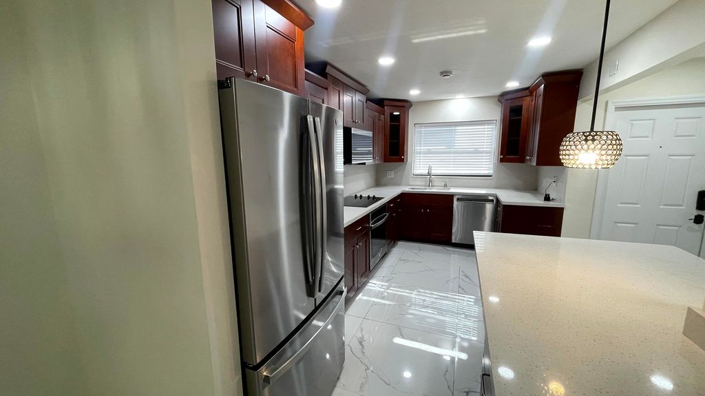 Photo of 9110 Orchid Tree Lane #138, Pembroke Pines, FL 33024 (MLS # B26028159)