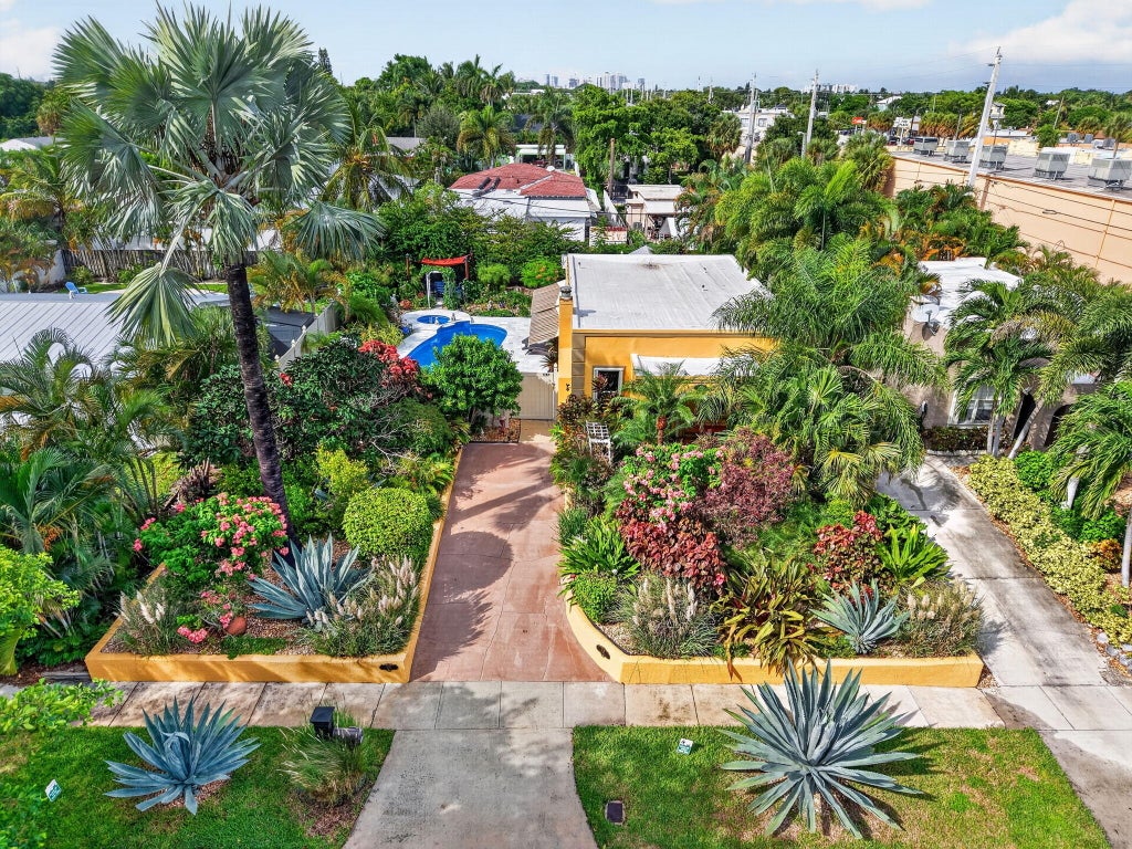 Photo of 415 Colonial Road, West Palm Beach, FL 33405 (MLS # B26084212)
